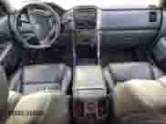 2006 Honda Pilot EX-L z VIN 5FNYF28556B052442, wystawiony jako Copart lot #80906705 z przebiegiem 193 224 mil mil oraz Szkoda całkowita • Salvage title. Historia ofert i sprzedaży dostępna na DreamBid. Obrazek 8.