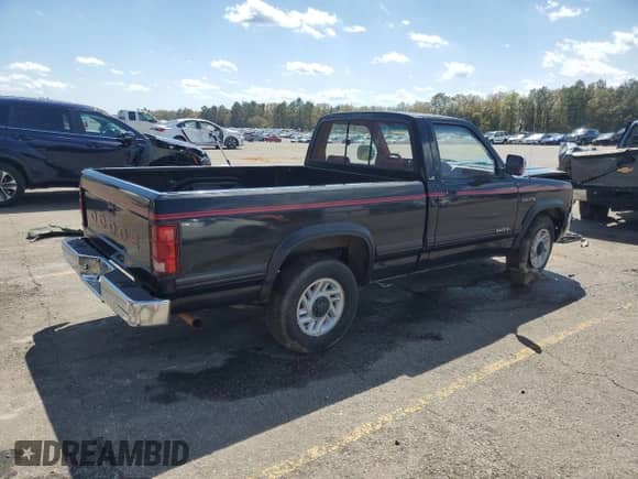 1992 Dodge Dakota with VIN 1B7GL26Y9NS516870, listed as a Copart auction lot 49988595 with 62,974 mi miles and Salvage title. Bid and sale history available at DreamBid. Image 3.
