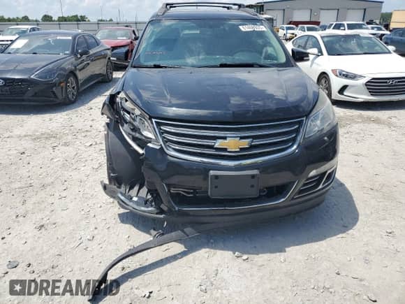 2013 Chevrolet Traverse LTZ z VIN 1GNKRLKD2DJ117778, wystawiony jako Copart lot #61408935 z przebiegiem 160 438 mil mil oraz Szkoda całkowita • Salvage title. Historia ofert i sprzedaży dostępna na DreamBid. Obrazek 5.
