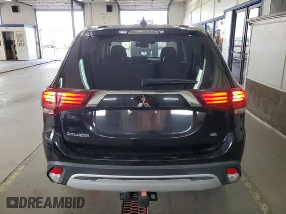 2020 Mitsubishi Outlander ES with VIN JA4AZ3A33LZ023450, listed as a Copart auction lot 80677835 with 84,237 mi miles and Salvage title. Bid and sale history available at DreamBid. Image 6.