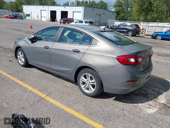 2018 Chevrolet Cruze LT with VIN 1G1BE5SM5J7153885, listed as a IAAI auction lot 43288366 with 40,829 mi miles and . Bid and sale history available at DreamBid. Image 3.