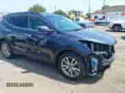 2016 Hyundai Santa Fe with VIN 5XYZUDLA7GG357896, listed as a IAAI auction lot 42808592 with 50,159 mi miles and . Bid and sale history available at DreamBid. Image 1.