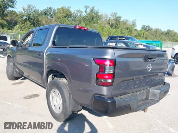 2022 Nissan Frontier S with VIN 1N6ED1EJ3NN633584, listed as a IAAI auction lot 43409367 with 99,897 mi miles and . Bid and sale history available at DreamBid. Image 3.