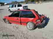 1990 Honda Civic with VIN 2HGED6344LH564439, listed as a Copart auction lot 77142714 with 157,214 mi miles and Salvage title. Bid and sale history available at DreamBid. Image 2.