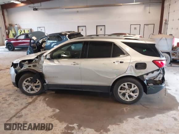 2021 Chevrolet Equinox Premier z VIN 3GNAXXEV8MS109583, wystawiony jako IAAI lot #43122552 z przebiegiem 88 070 mil mil oraz . Historia ofert i sprzedaży dostępna na DreamBid. Obrazek 15.