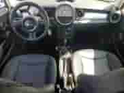 2011 MINI Hardtop with VIN WMWSU3C52BT096248, listed as a Copart auction lot 62008285 with 129,794 mi miles and Salvage title. Bid and sale history available at DreamBid. Image 8.