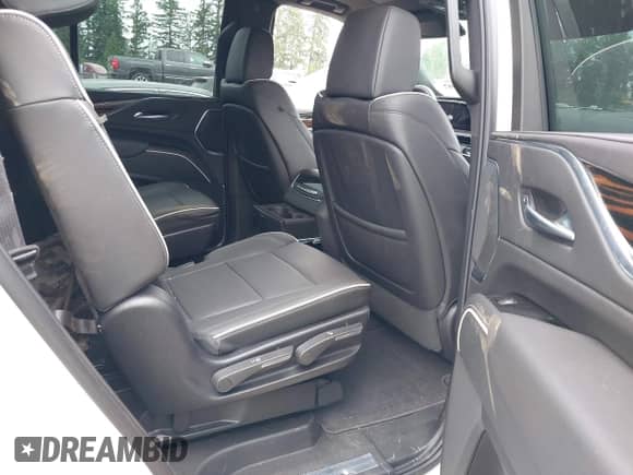 2023 Cadillac Escalade with VIN 1GYS4BKT3PR525151, listed as a IAAI auction lot 42478007 with 26,714 mi miles and . Bid and sale history available at DreamBid. Image 8.