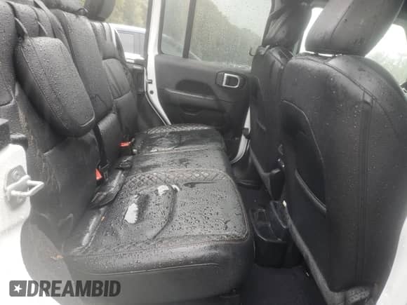 2022 Jeep Wrangler Unlimited Sahara with VIN 1C4JJXP61NW159845, listed as a Copart auction lot 86151705 with 63,224 mi miles and Salvage title. Bid and sale history available at DreamBid. Image 11.