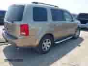 2009 Honda Pilot Touring with VIN 5FNYF38809B004142, listed as a IAAI auction lot 42337103 with 152,874 mi miles and . Bid and sale history available at DreamBid. Image 4.