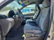 2010 Honda Odyssey LX с VIN 5FNRL3H2XAB014495, выставлен на аукционе Copart как лот 62425955 с пробегом 228 897 миль миль и Списание • Salvage title. История ставок и продаж доступна на DreamBid. Изображение 7.