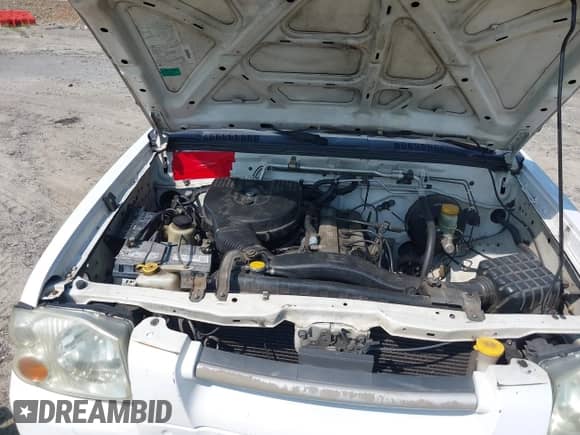 2002 Nissan Frontier XE with VIN 1N6DD26S82C369553, listed as a IAAI auction lot 42579202 with 392,819 mi miles and . Bid and sale history available at DreamBid. Image 10.