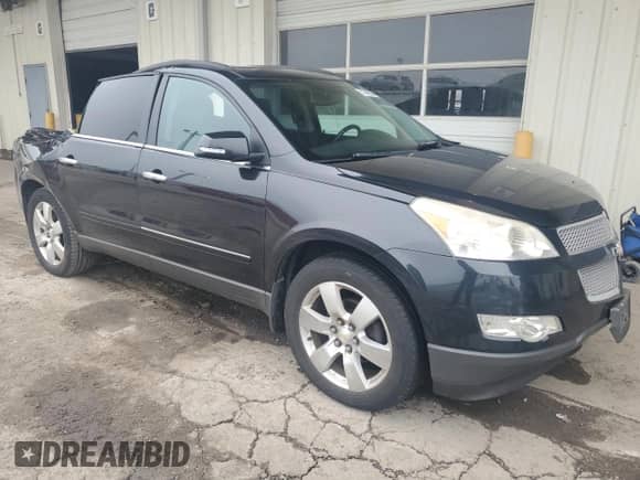 2011 Chevrolet Traverse LTZ z VIN 1GNKVLED4BJ367933, wystawiony jako Copart lot #51948005 z przebiegiem 152 430 mil mil oraz Czysty tytuł • Clean title. Historia ofert i sprzedaży dostępna na DreamBid. Obrazek 4.