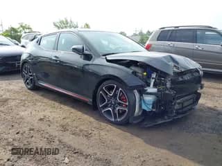 2021 Hyundai Veloster z VIN KMHT36AH0MU009836, wystawiony jako IAAI lot #42416488 z przebiegiem 28 247 mil mil oraz . Historia ofert i sprzedaży dostępna na DreamBid. Obrazek 1.