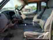 2000 Nissan Frontier XE with VIN 1N6ED26TXYC332543, listed as a Copart auction lot 64014015 with 186,261 mi miles and Salvage title. Bid and sale history available at DreamBid. Image 7.