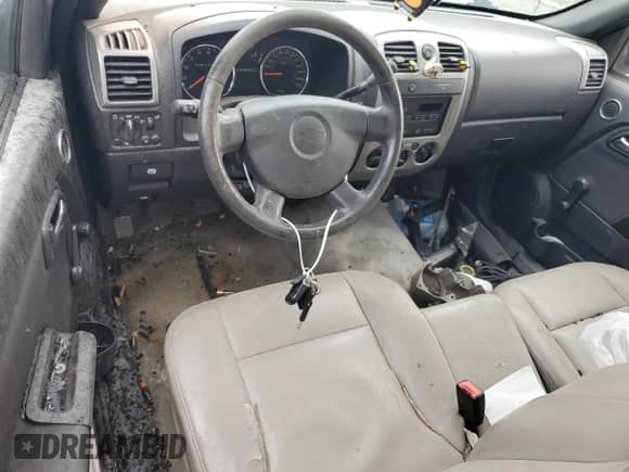 2012 Chevrolet Colorado Work Truck z VIN 1GCCSBFE4C8116622, wystawiony jako Copart lot #50957455 z przebiegiem Nie podano mil oraz Szkoda całkowita • Salvage title. Historia ofert i sprzedaży dostępna na DreamBid. Obrazek 8.