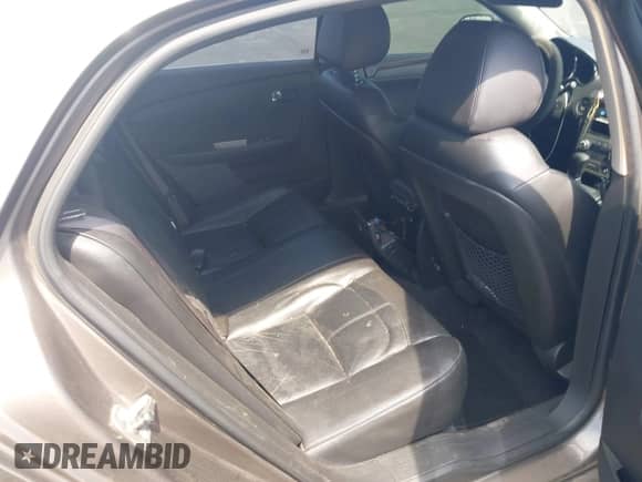 2012 Chevrolet Malibu LTZ z VIN 1G1ZG5E77CF164975, wystawiony jako IAAI lot #42513864 z przebiegiem 195 299 mil mil oraz . Historia ofert i sprzedaży dostępna na DreamBid. Obrazek 8.