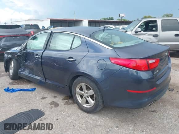 2015 Kia Optima LX with VIN 5XXGM4A73FG488602, listed as a IAAI auction lot 43008817 with 87,198 mi miles and . Bid and sale history available at DreamBid. Image 3.