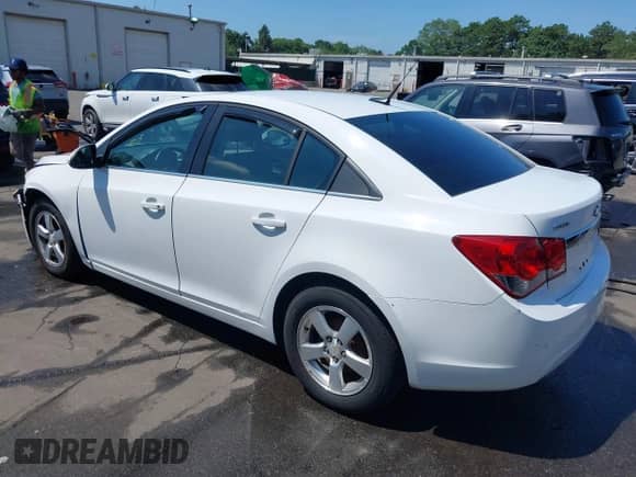 2011 Chevrolet Cruze 1LT z VIN 1G1PF5S92B7295384, wystawiony jako IAAI lot #42702224 z przebiegiem 143 042 mil mil oraz . Historia ofert i sprzedaży dostępna na DreamBid. Obrazek 3.