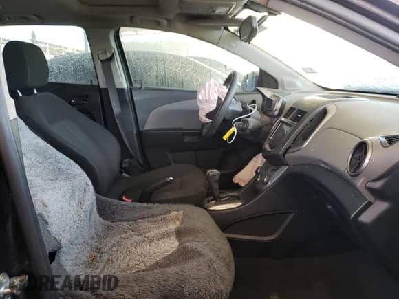 2014 Chevrolet Sonic LT with VIN 1G1JC6SB1E4157803, listed as a Copart auction lot 57115460 with 64,877 mi miles and Salvage title. Bid and sale history available at DreamBid. Image 5.