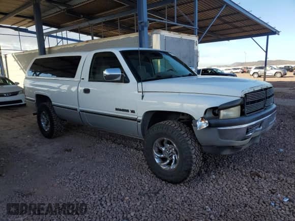 1996 Dodge 1500 with VIN 1B7HF16Z1TJ145625, listed as a Copart auction lot 45428985 with 126,610 mi miles and Salvage title. Bid and sale history available at DreamBid. Image 4.