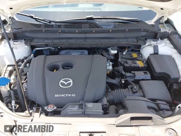 2023 Mazda CX-5 S Carbon Edition z VIN JM3KFBCM9P0286384, wystawiony jako IAAI lot #42497951 z przebiegiem 9 448 mil mil oraz . Historia ofert i sprzedaży dostępna na DreamBid. Obrazek 10.