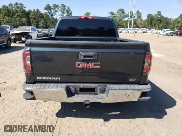 2018 GMC Sierra 1500 SLT z VIN 3GTP1NEC4JG562301, wystawiony jako Copart lot #72045625 z przebiegiem 58 403 mil mil oraz Szkoda całkowita • Salvage title. Historia ofert i sprzedaży dostępna na DreamBid. Obrazek 6.