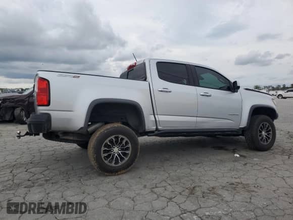 2019 Chevrolet Colorado 4WD ZR2 with VIN 1GCGTEEN0K1243697, listed as a Copart auction lot 83839115 with 131,895 mi miles and Salvage title. Bid and sale history available at DreamBid. Image 3.