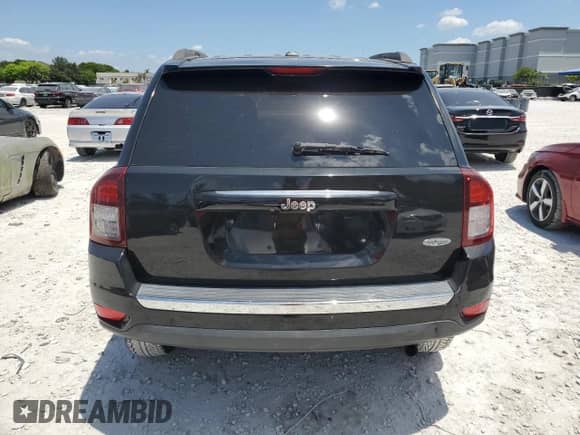 2015 Jeep Compass High Altitude with VIN 1C4NJCEA0FD178823, listed as a Copart auction lot 57904775 with 106,240 mi miles and Salvage title. Bid and sale history available at DreamBid. Image 6.
