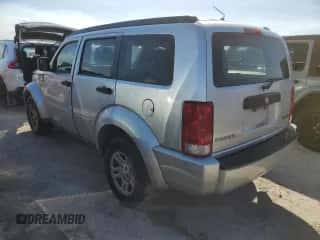 2011 Dodge Nitro SE с VIN 1D4PT2GK1BW587062, выставлен на аукционе Copart как лот 77384584 с пробегом 120 977 миль миль и На запчасти • Non repairable. История ставок и продаж доступна на DreamBid. Изображение 2.