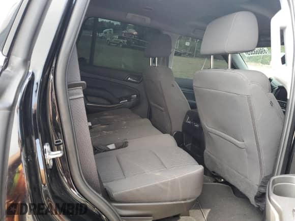 2020 Chevrolet Tahoe LS z VIN 1GNSKAKC4LR166979, wystawiony jako Copart lot #69868525 z przebiegiem Nie podano mil oraz Szkoda całkowita • Salvage title. Historia ofert i sprzedaży dostępna na DreamBid. Obrazek 10.