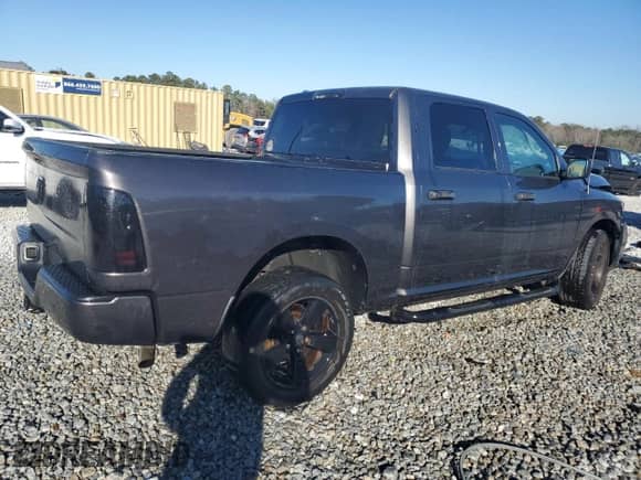 2018 Ram 1500 Express with VIN 1C6RR6KG8JS259388, listed as a Copart auction lot 85570644 with 160,997 mi miles and Salvage title. Bid and sale history available at DreamBid. Image 3.