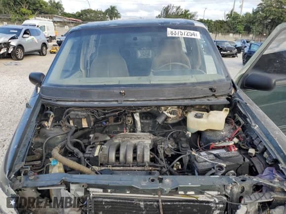 1993 Dodge Caravan Grand SE with VIN 1B4GH44R0PX686790, listed as a Copart auction lot 83757254 with 287,137 mi miles and Salvage title. Bid and sale history available at DreamBid. Image 12.