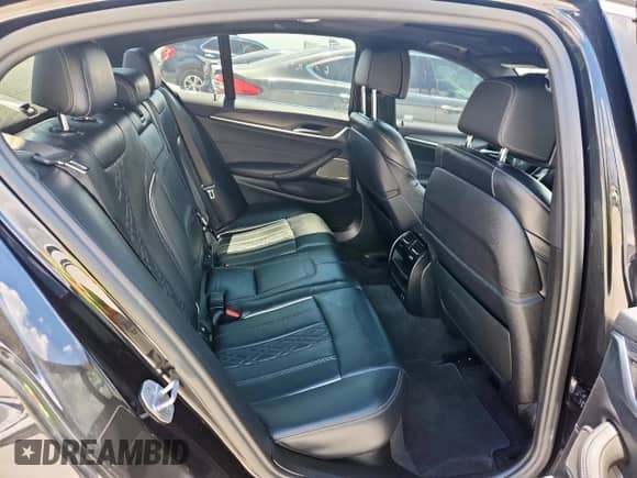 2022 BMW 5 Series 530i xDrive z VIN WBA13BJ09NCJ00249, wystawiony jako Copart lot #69185245 z przebiegiem 57 127 mil mil oraz Szkoda całkowita • Salvage title. Historia ofert i sprzedaży dostępna na DreamBid. Obrazek 10.