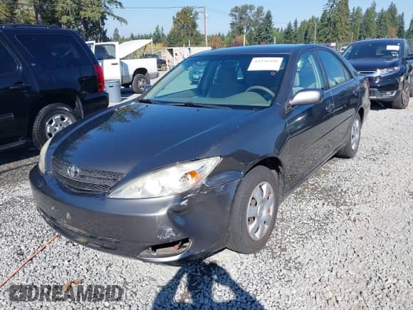 2003 Toyota Camry LE with VIN JTDBE32K530180767, listed as a IAAI auction lot 43276458 with 189,568 mi miles and . Bid and sale history available at DreamBid. Image 6.