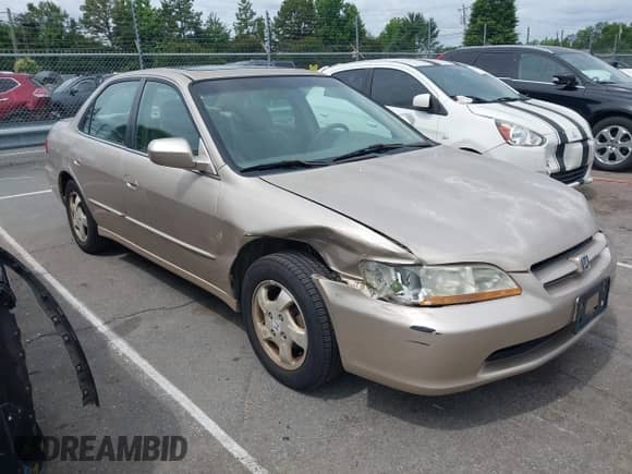2000 Honda Accord EX with VIN 1HGCG5654YA014791, listed as a IAAI auction lot 42458882 with 202,447 mi miles and . Bid and sale history available at DreamBid. Image 6.