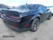 2021 Dodge Challenger R/T Scat Pack Widebody with VIN 2C3CDZFJ7MH677011, listed as a IAAI auction lot 43412091 with 26,783 mi miles and . Bid and sale history available at DreamBid. Image 4.