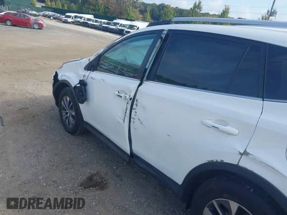 2015 Toyota RAV4 LE with VIN 2T3BFREV3FW370329, listed as a IAAI auction lot 43249736 with 108,001 mi miles and . Bid and sale history available at DreamBid. Image 6.