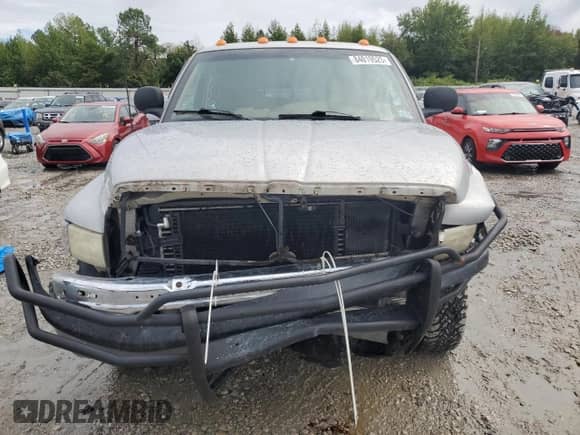 1999 Dodge 2500 with VIN 1B7KF2369XJ516946, listed as a Copart auction lot 84019525 with 178,308 mi miles and Salvage title. Bid and sale history available at DreamBid. Image 5.