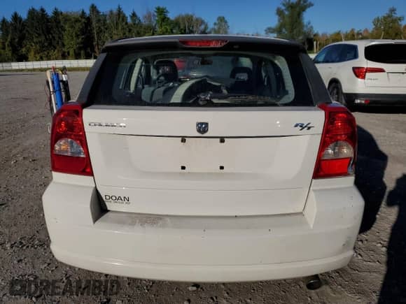 2007 Dodge Caliber R/T with VIN 1B3HB78K27D305631, listed as a Copart auction lot 81830255 with 46,859 mi miles and Salvage title. Bid and sale history available at DreamBid. Image 6.