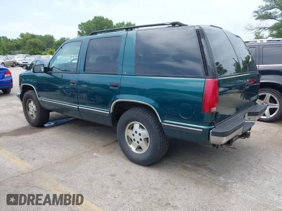 1995 Chevrolet Tahoe with VIN 1GNEK13K3SJ367675, listed as a IAAI auction lot 42854605 with 2,124,982 mi miles and . Bid and sale history available at DreamBid. Image 3.