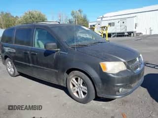 2012 Dodge Grand Caravan Crew with VIN 2C4RDGDG1CR123361, listed as a IAAI auction lot 43418401 with 169,040 mi miles and . Bid and sale history available at DreamBid. Image 1.
