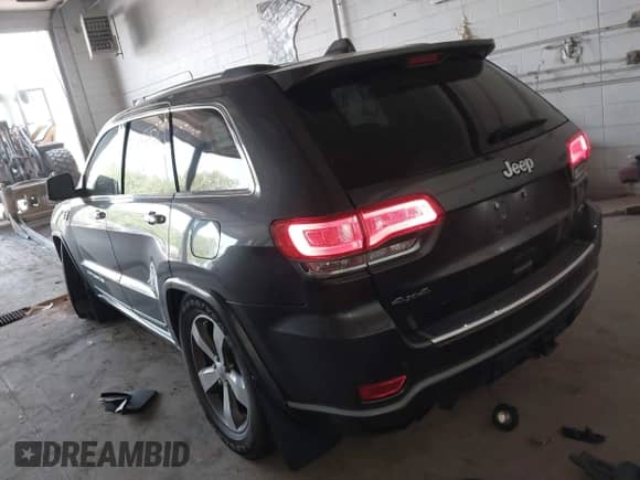 2015 Jeep Grand Cherokee High Altitude with VIN 1C4RJFCG2FC925791, listed as a IAAI auction lot 42454976 with 81,066 mi miles and . Bid and sale history available at DreamBid. Image 3.