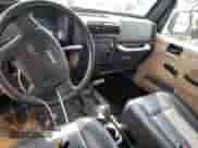 2004 Jeep Wrangler SE z VIN 1J4FA29164P793438, wystawiony jako Copart lot #71223435 z przebiegiem 159 757 mil mil oraz Szkoda całkowita • Salvage title. Historia ofert i sprzedaży dostępna na DreamBid. Obrazek 8.