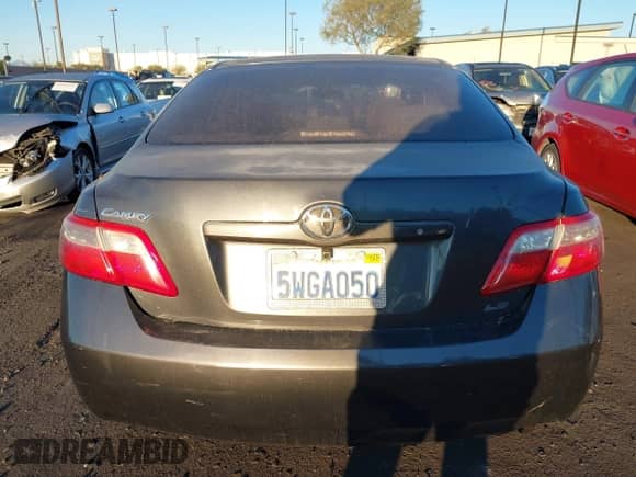 2007 Toyota Camry CE z VIN 4T1BE46K07U061955, wystawiony jako IAAI lot #43475755 z przebiegiem 187 299 mil mil oraz . Historia ofert i sprzedaży dostępna na DreamBid. Obrazek 12.