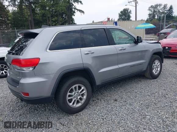 2018 Jeep Grand Cherokee Altitude with VIN 1C4RJEAG6JC113657, listed as a IAAI auction lot 43089607 with 61,674 mi miles and . Bid and sale history available at DreamBid. Image 4.