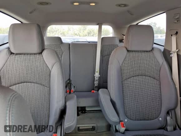 2015 Chevrolet Traverse LT z VIN 1GNKRGKDXFJ117215, wystawiony jako Copart lot #81450115 z przebiegiem 174 708 mil mil oraz Czysty tytuł • Clean title. Historia ofert i sprzedaży dostępna na DreamBid. Obrazek 10.