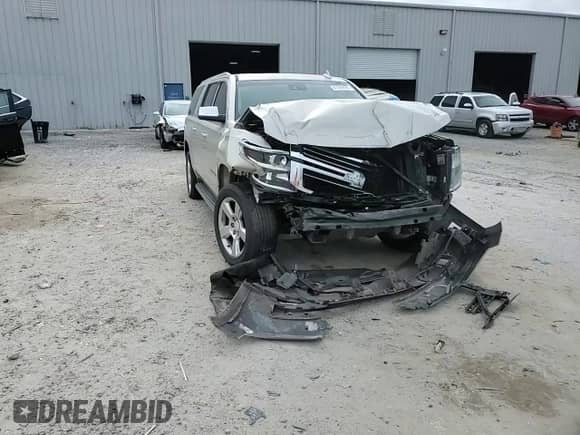 2016 Chevrolet Suburban LTZ z VIN 1GNSCJKCXGR215959, wystawiony jako Copart lot #41459895 z przebiegiem Nie podano mil oraz Szkoda całkowita • Salvage title. Historia ofert i sprzedaży dostępna na DreamBid. Obrazek 12.
