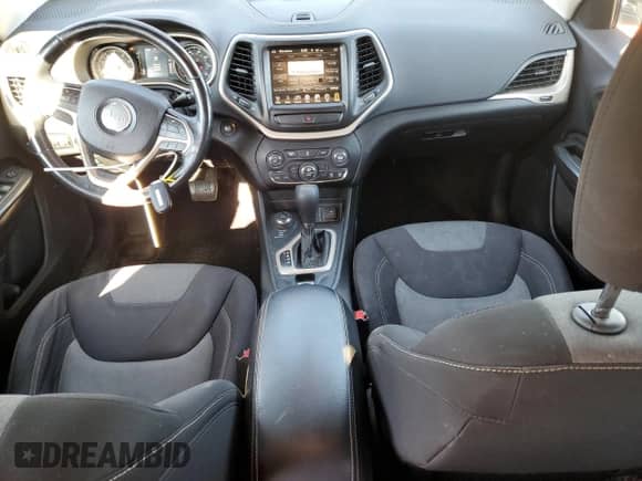 2014 Jeep Cherokee Latitude with VIN 1C4PJMCS9EW126037, listed as a Copart auction lot 81090325 with 86,721 mi miles and Salvage title. Bid and sale history available at DreamBid. Image 8.