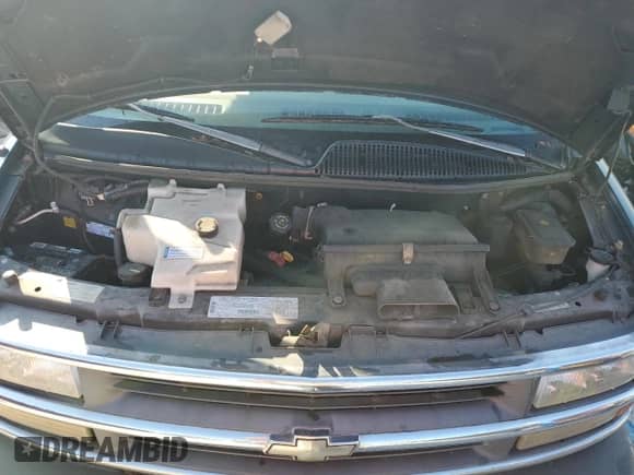 1996 Chevrolet Chevy Van z VIN 1GBFG15R1T1013975, wystawiony jako Copart lot #81642265 z przebiegiem 46 312 mil mil oraz Szkoda całkowita • Salvage title. Historia ofert i sprzedaży dostępna na DreamBid. Obrazek 12.