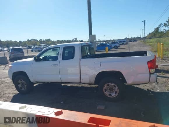 2016 Toyota Tacoma SR with VIN 5TFRX5GN4GX058969, listed as a IAAI auction lot 43590771 with 237,437 mi miles and . Bid and sale history available at DreamBid. Image 14.